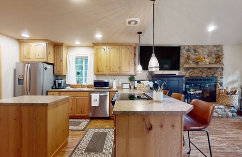 Anderson Island House | Tree-lined Anderson Island home with porch & fenced yard, near dock/tennis