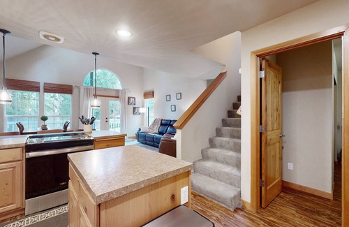 Anderson Island House | Tree-lined Anderson Island home with porch & fenced yard, near dock/tennis