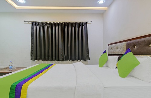 Indore House | Treebo Jayshree Palace C21 Business Park
