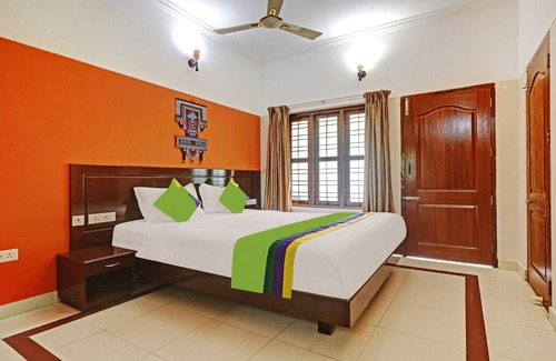 Kovalam Hotel | Treebo Trend Green Palm Resorts