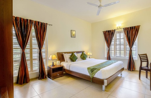 Stuart Hill Hotel | Treebo Trend Oleander Serviced Apartments Coorg