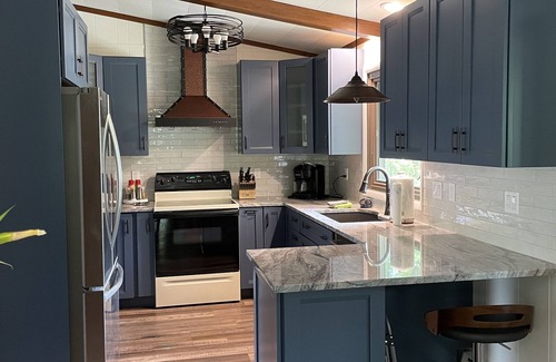 Holland House | Treetop views from every window. sleeps 8, 4 bedrooms 2 full baths.