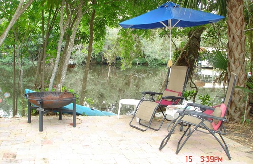 Bonita Springs Cottage | Treetops Riverfront Private Cottage w/Dock,wildlife,kayak,bike,pool,100+ reviews