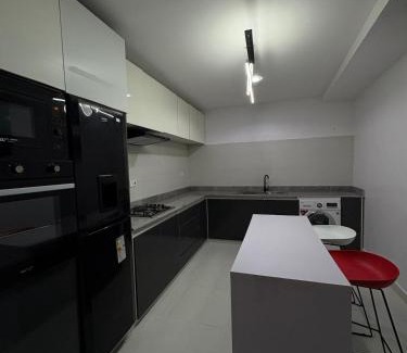 Lekki Phase 1 Apartment | Trendy 2-BDR Apt Villa with Pool,Wi-Fi, Netflix, Modern Amenities & PS5 Near Elegushi Beach Lekki