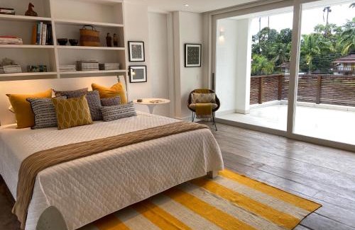 Pontal House | Tropical Contemporary Suites