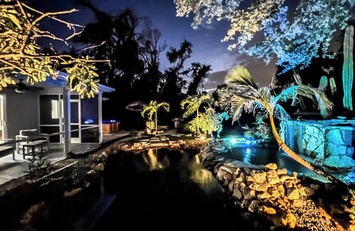 Port Charlotte House | Tropical Home With Waterfall, HotTub, Fenced Yard, Beachy Lounge Area & Pets!