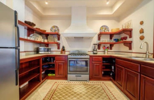 San Pedro Condo | Tropical island paradise! Luxury 2 bd 2 bath condo on beach with stunning pool