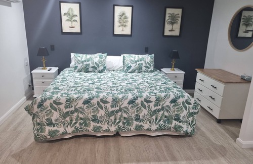 Nome House | TROPICAL RETREAT- relax and unwind surrounded by tropical gardens with huge pool