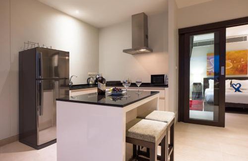 Ban Saiyuan Apartment | Tropical Serenity - Elegant 1 Bedroom with Pool