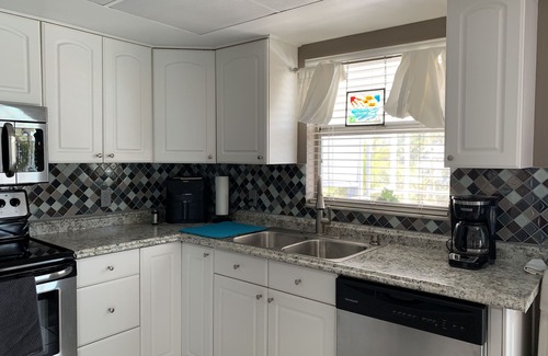 Caloosahatchee House | Tropical Snowbird Retreat with Heated Pool