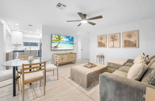 Melaleuca Gardens House | Tropical Waterfront Oasis with Hot tub Jacuzzi