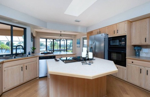 Punta Gorda House | Tropical-Waterfront|Htd Pool-Spa-Dock-Kayaks-Bikes