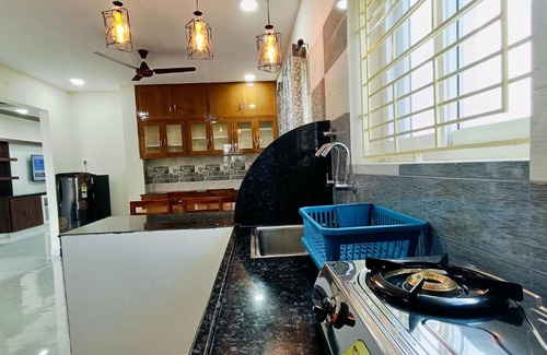 Tirupati Apartment | TrueLife - Chinmai Nivas - Breakfast Included - Modern 2BHK homes for families - Tirumala Mountain View - Fast WiFi - Many restaurants nearby - Hall, AC bedrooms, Modular Kitchen - Android TV - 250 Jio Channels - Top Service with lots of Love