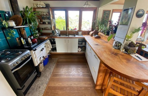Tryphena House | Tryphena sunset and sea views! 5 minute walk to beaches, shops and restaurants.