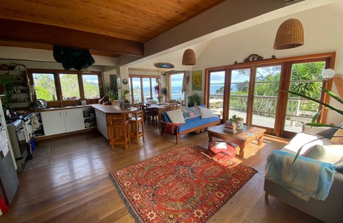 Tryphena House | Tryphena sunset and sea views! 5 minute walk to beaches, shops and restaurants.