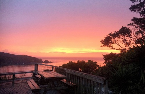 Tryphena House | Tryphena sunset and sea views! 5 minute walk to beaches, shops and restaurants.