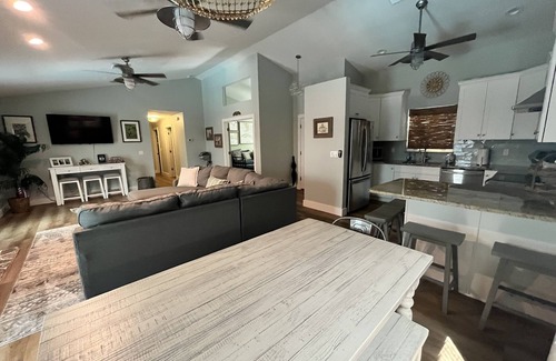 Englewood House | Tucked Away on Wooded Way located blocks from Manasota Beach with Heated Pool.