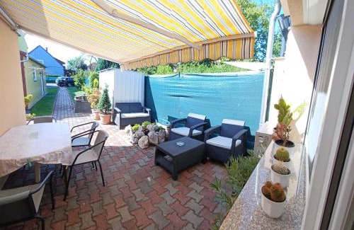 Bukfurdo House | Tulipán Apartmanház