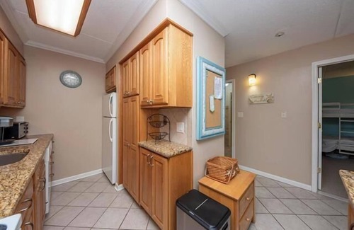 North End Condo | Two balconies offer stunning views of the Bridge and Ocean in the distance.