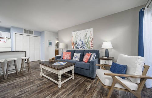 Heron Harbour Isle Condo | Two bedroom. 2 bath bayside condo with outdoor pool and private courtyard