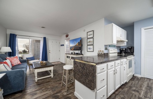 Heron Harbour Isle Condo | Two bedroom. 2 bath bayside condo with outdoor pool and private courtyard