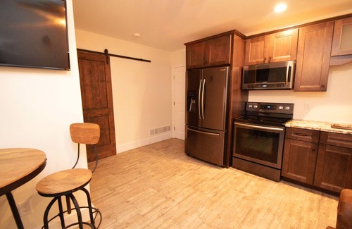 Oaks Corners Bed & Breakfast | Two Bedroom North Condo at our Lakefront Paradise. Pool, Hot Tub, Kayaks and more. (Sleeps 4 Adults)