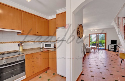 Denia Ski Chalet | Two bedroom terrace house with stunning communal pool and gardens