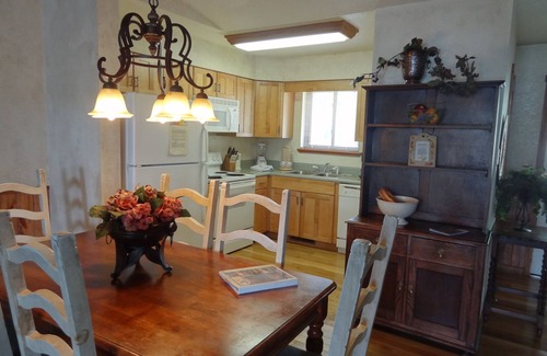 Mount Ida Cottage | Two bedroom, two bath, log-sided, luxury Harbor North cottage overlooking Lake Ouachita. by RedAwning