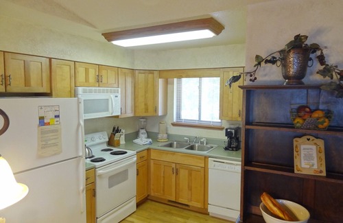Mount Ida Cottage | Two bedroom, two bath, log-sided, luxury Harbor North cottage overlooking Lake Ouachita. by RedAwning