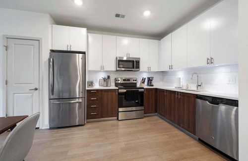 Downtown Louisville Apartment | Two Charming Nulu CozySuites