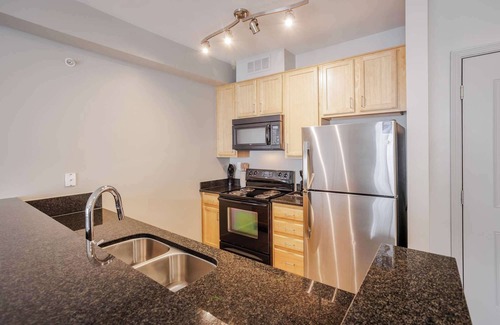 Central Business District Apartment | TWO CozySuites at the Banks 17