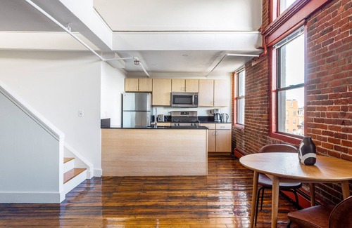 South End House | Two-level South End Loft w/Pool, Art Gallery, Steps to T by Blueground