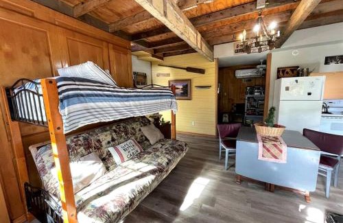 Marble Falls House | Two-Story Cabin Rental for Large Groups along Hamilton Creek in Marble Falls, Texas