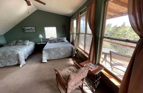 Marble Falls House | Two-Story Cabin Rental for Large Groups along Hamilton Creek in Marble Falls, Texas
