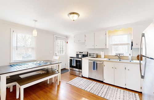 Harwich House | Two-story dog-friendly retreat with enclosed yard, playset, W/D, & firepit