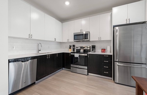 Downtown Louisville Apartment | Two Stylish Nulu CozySuites