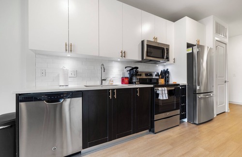 Downtown Louisville Apartment | Two Stylish Nulu CozySuites