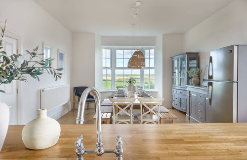 Llanerchymedd Cottage | Tŷ a Chaban Carmel - Carmel House and Cabin - sleeps 22, stunning views, hot tub & wood burner