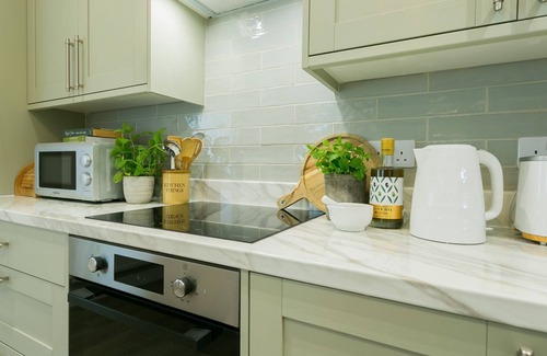Bodorgan Cottage | Ty Cadwgan - a cosy fire that sleeps 4 guests in 2 bedrooms