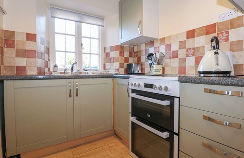 Bangor Cottage | TYDDYN ISAF BACH, romantic, with open fire in Talybont Near Bangor