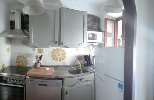 Benabbio Apartment | Typical house with garden and veranda in ancient village