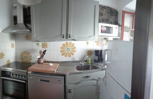 Benabbio Apartment | Typical house with garden and veranda in ancient village