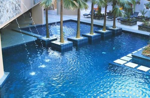 Pasig Apartment | U607 Sunshine100 Netflix 65InchesTV Wifi Karaoke Swimming Pool