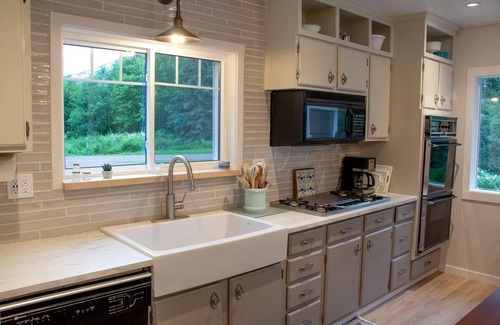 Holcombe House | Ultimate Family Lake Retreat w/Swim Slide, Sandy bottom, and Bar/TV Lounge