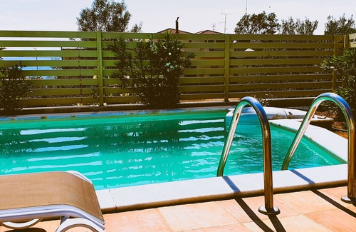 Porto Heli Apartment | Unique 2 bedroom apartment with garden and pool