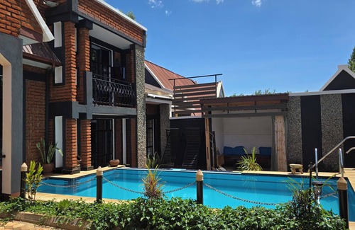 Karatu Apartment | Unique Homestays A - 2 bedrooms with swimming pool and Free Wi-Fi