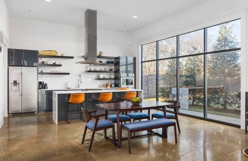 Urbandale Nations House | Unique Modern Ranch with Pool, Hot Tub, Grill & Fireplace