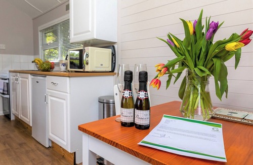 Berrynarbor Ski Chalet | Unique, peaceful, cosy and quaint cedar wood built holiday lodge.