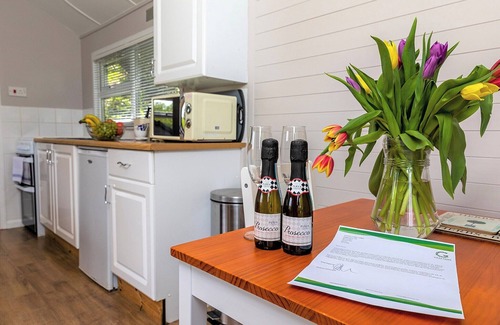 Berrynarbor Ski Chalet | Unique, peaceful, cosy and quaint cedar wood built holiday lodge.