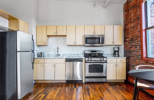 South End House | Unique South End Loft w/Pool, Art Gallery, Steps to T by Blueground